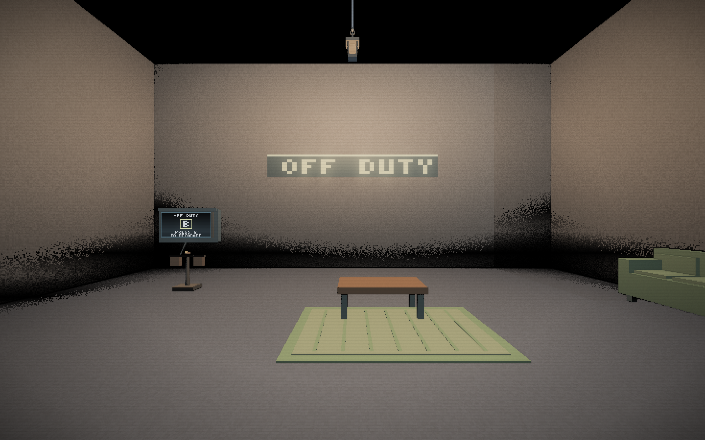 The Off Duty area with its decorating monitor, sofa, coffee table and rug.